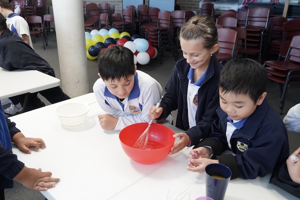 Students making pearls