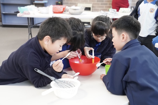 Students making pearls